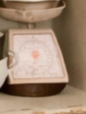 Beige and Brown Vintage-Style Kitchen Scale and wood heart cutting board